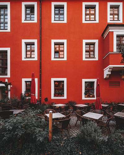 home decor brown chairs near red concrete house bautzen